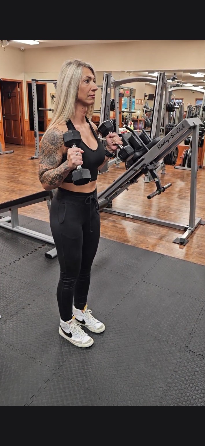 Mandy working out with dumbbells